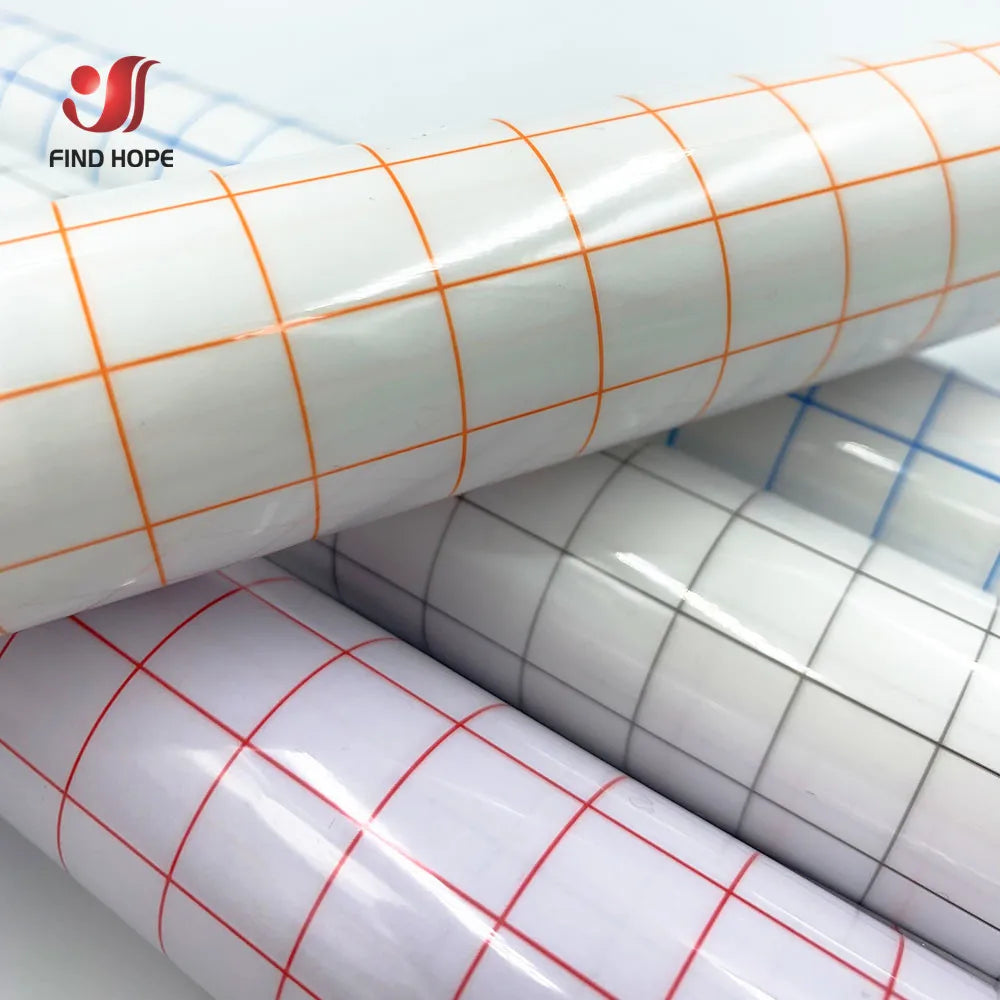 Alignment grid transfer tape for custom vinyl designs